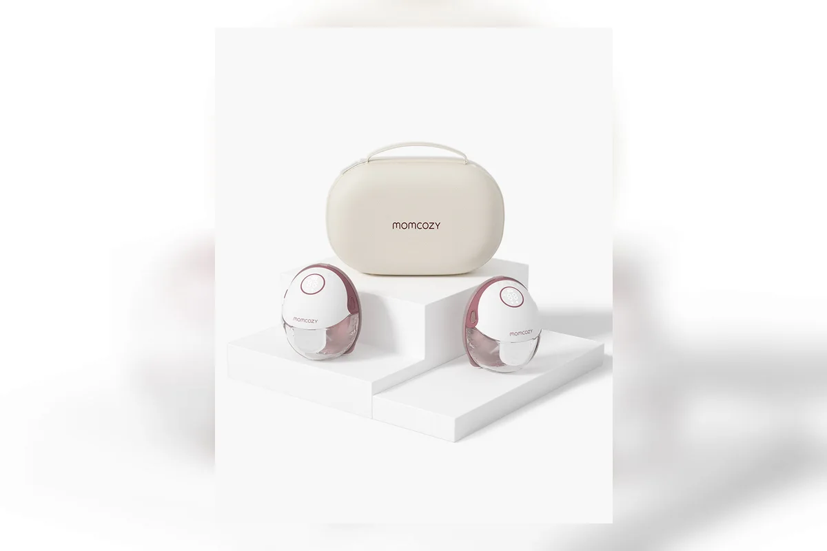 Flat-lay of wearable and standard breast pumps with collection bottles for exclusive pumping